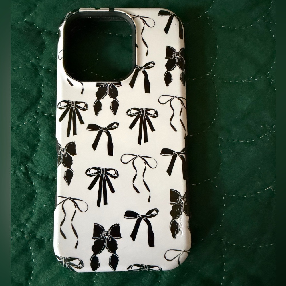 Casely IPhone 16 Pro Black and White Bow Case